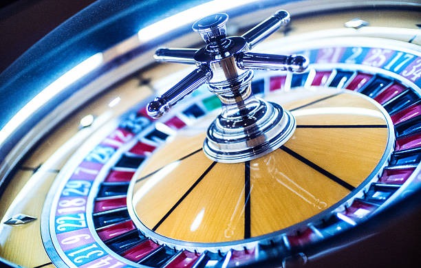 Roulette wheel close-up showing ball placement and numbered pockets